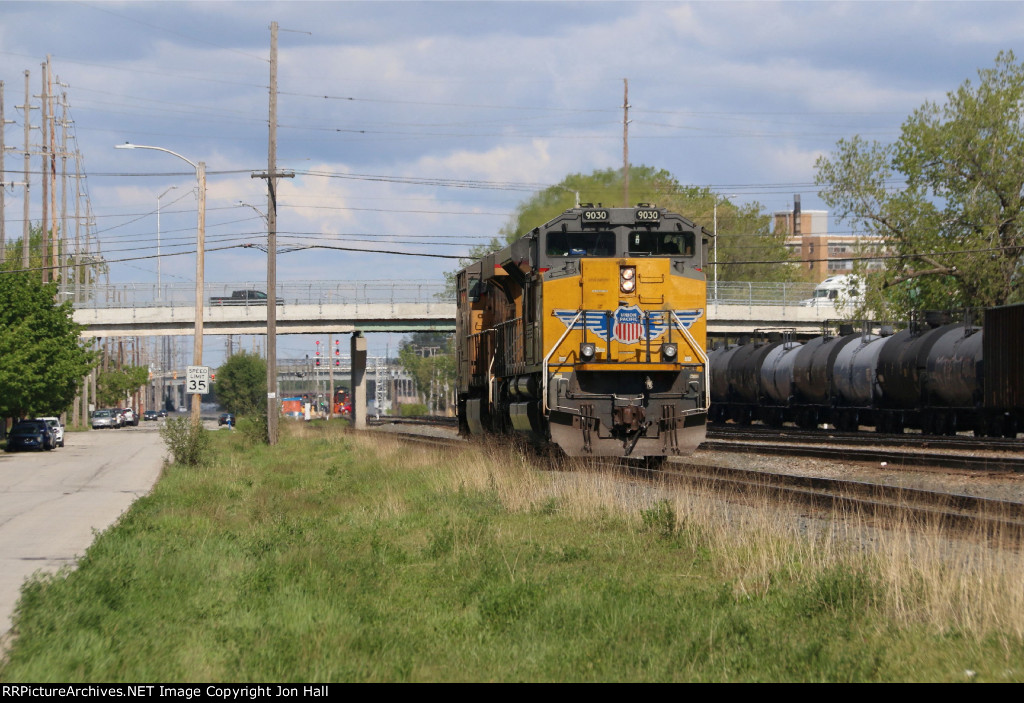 UP light power comes in to Gibson Yard to pick up an autorack train